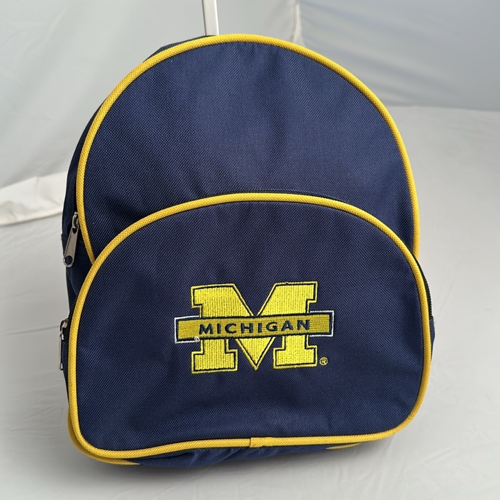 Mighty Mac University of Michigan Wolverines logo blue and yellow mini backpack